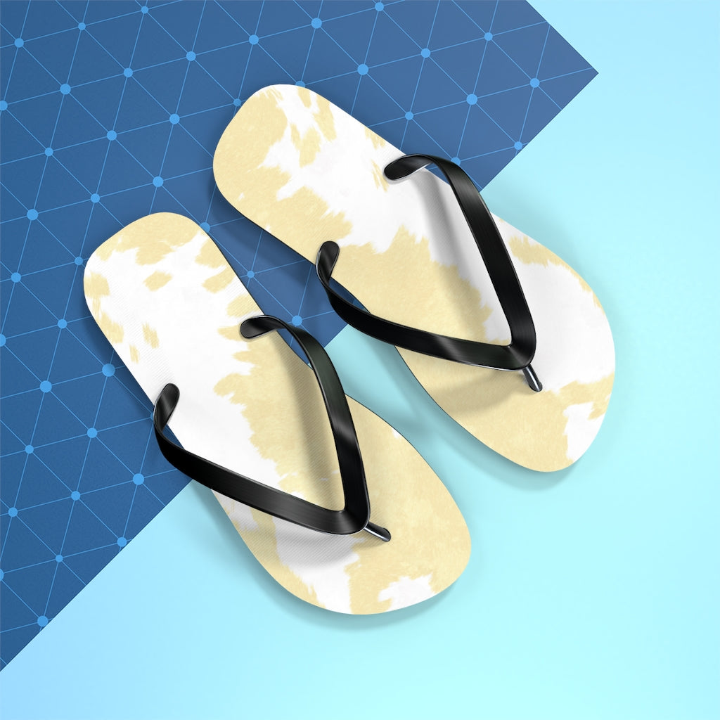 Cream Cow Print Flip Flops