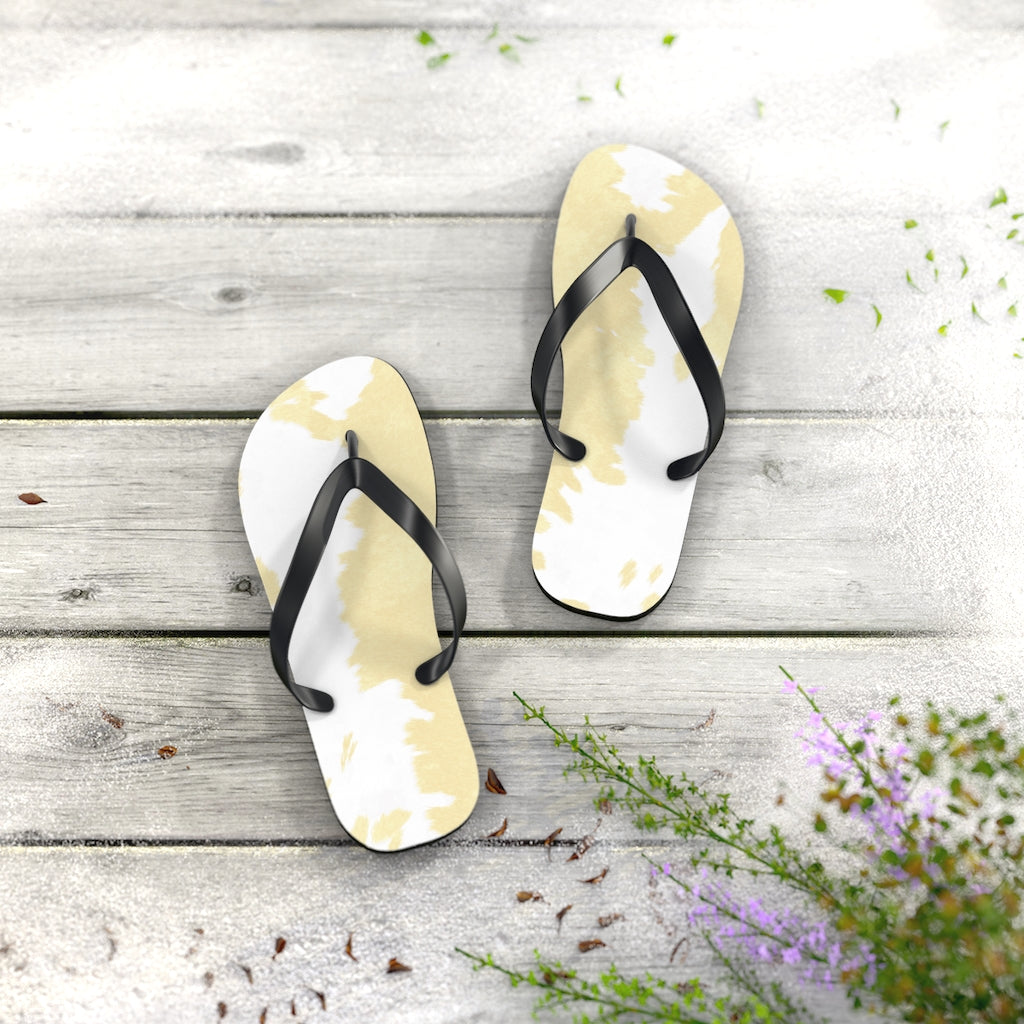 Cream Cow Print Flip Flops