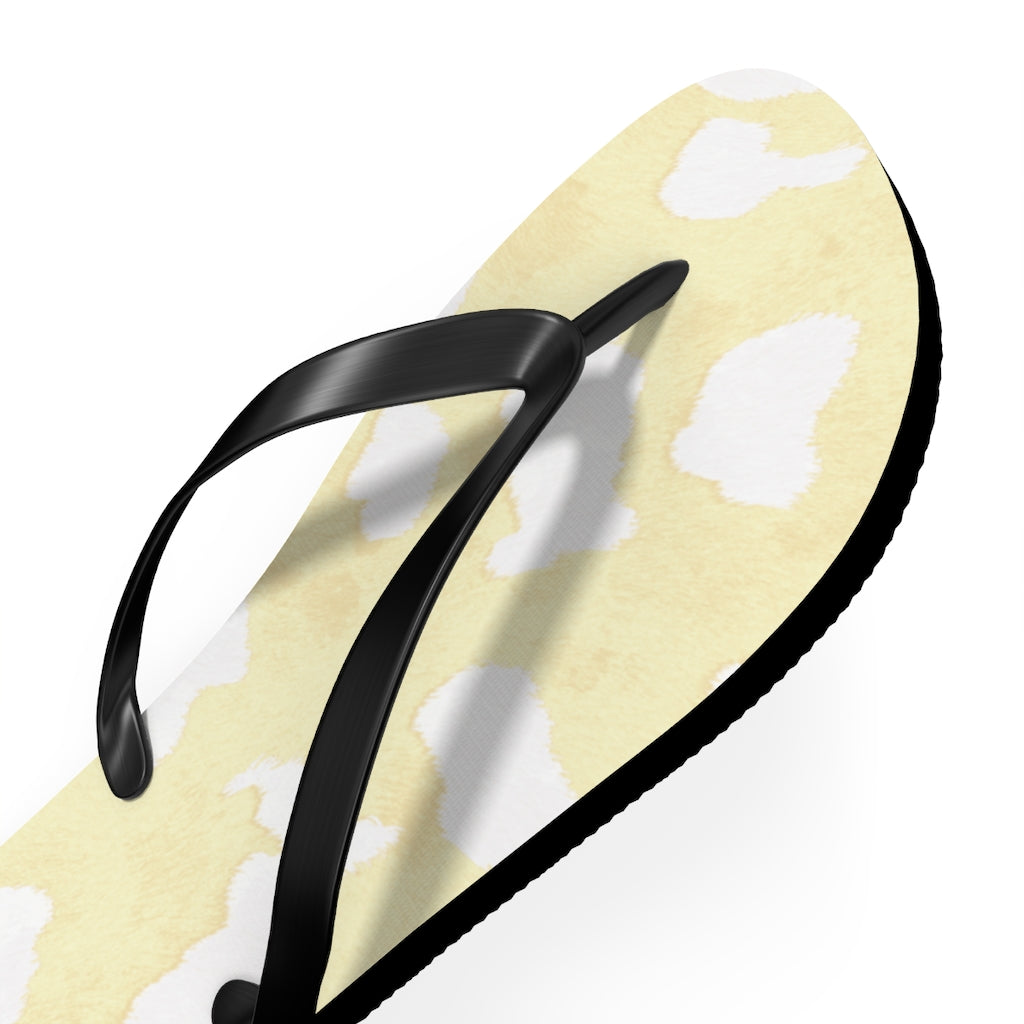 Cream Cow Print Flip Flops